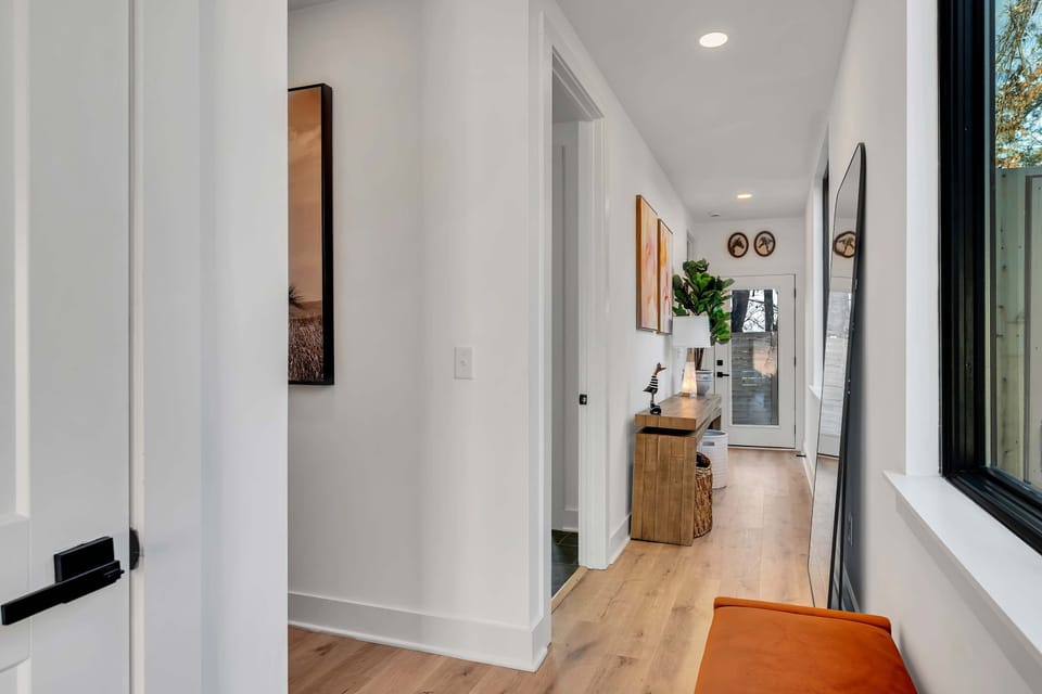 Welcome to your Nashville getaway! This chic vacation rental boasts an elegant hallway and modern decor, perfect for large groups, family reunions, or bachelorette parties. Enjoy a blend of comfort and sophistication for an unforgettable stay!