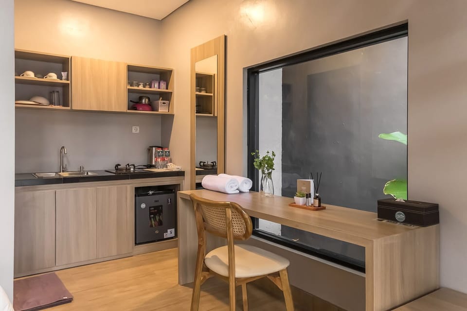 Basic Villa | Private kitchen | Mini-fridge, stovetop, electric kettle, cookware/dishes/utensils