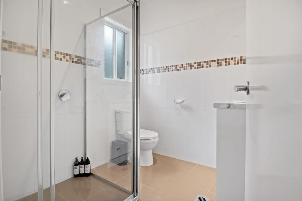 Ensuite Bathroom - Shower + Toilet