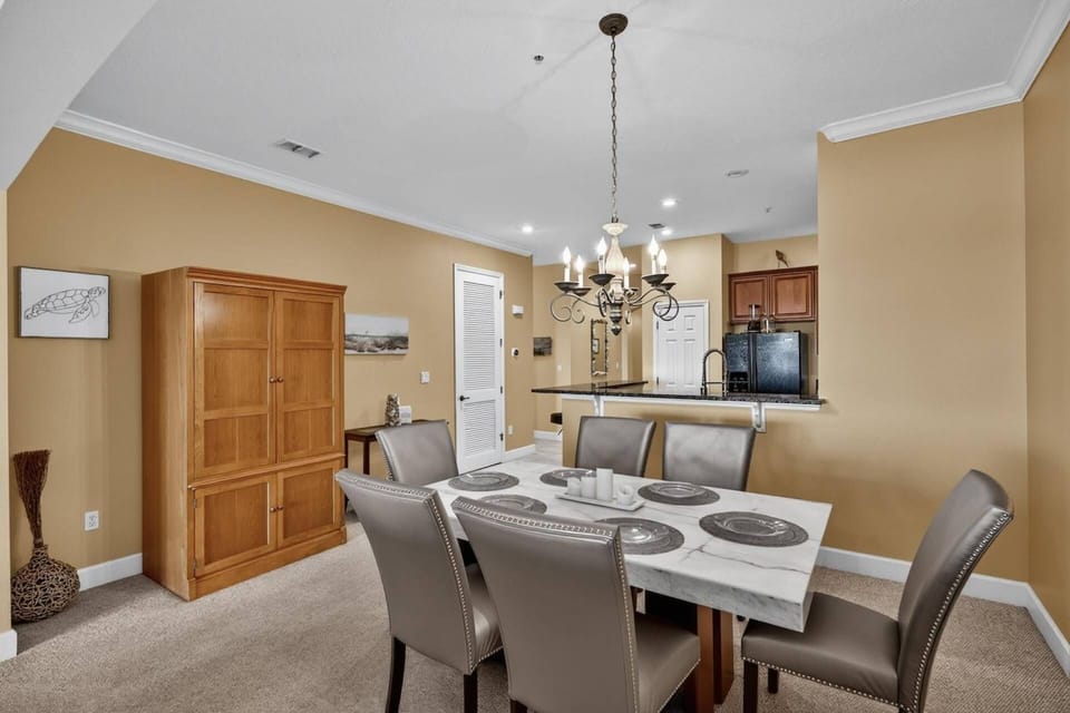 Dining space just off the kitchen and living area, offering a welcoming spot for shared meals, easy conversation, and convenient entertaining.