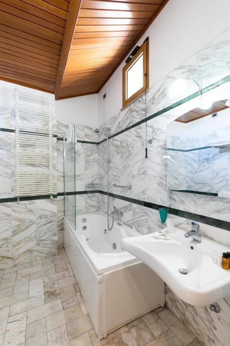 Shower, free toiletries, hair dryer, slippers