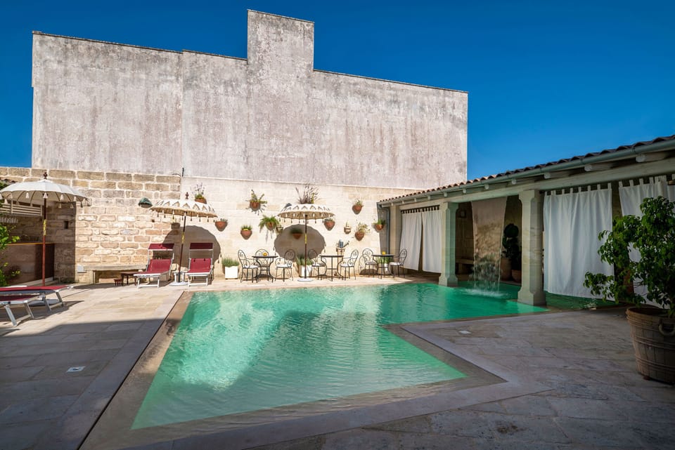 Seasonal outdoor pool, pool umbrellas, sun loungers