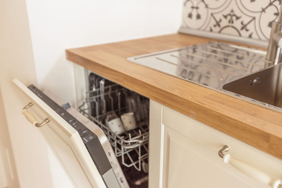Kitchen, Countertop, Wood, Interior Design, Flooring, Cabinetry, Kitchen Appliance, Major Appliance, Floor, Home
