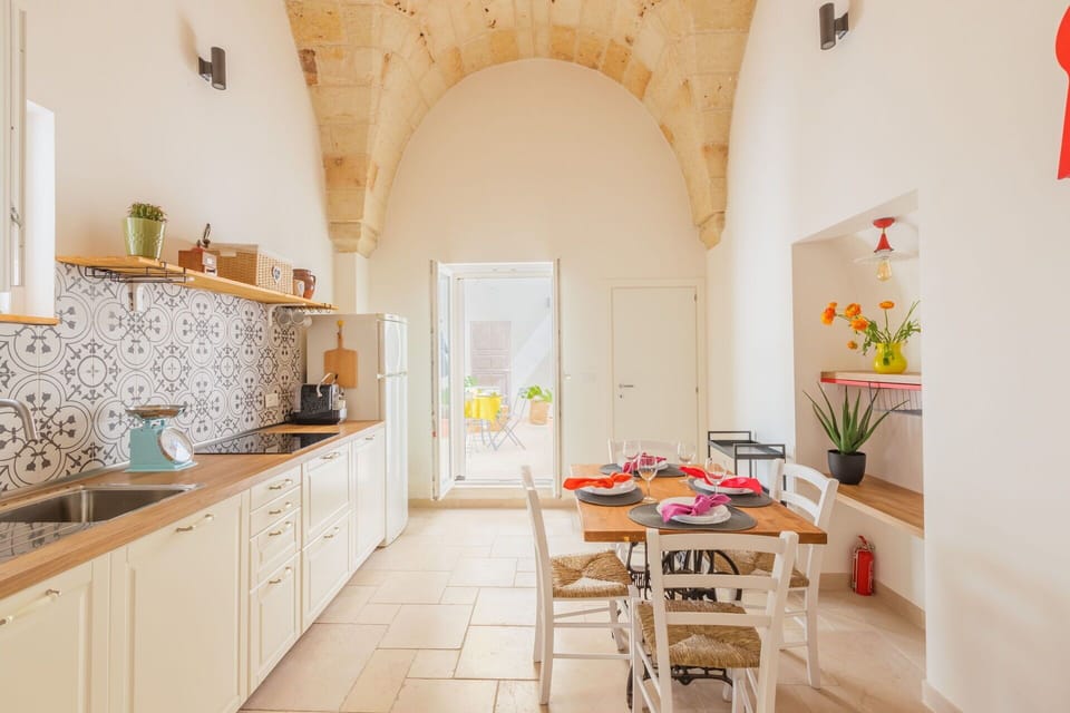 Interior Design, Furniture, Flooring, Ceiling, Floor, Chair, Room, Kitchen & Dining Room Table, Light Fixture, Tile