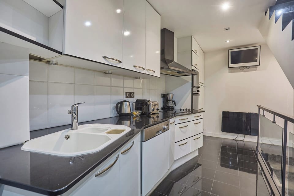 Apartment | Private kitchen | Cleaning supplies