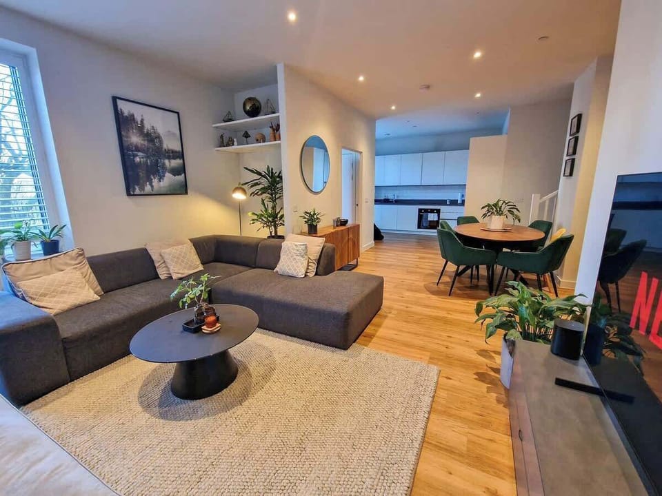 Gather around the dining table for a home-cooked meal or a few drinks before heading out for the evening