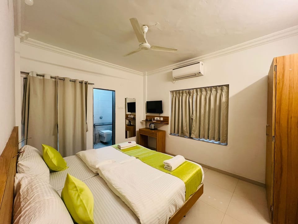Deluxe Room, Balcony, City View | Desk, laptop workspace, free WiFi