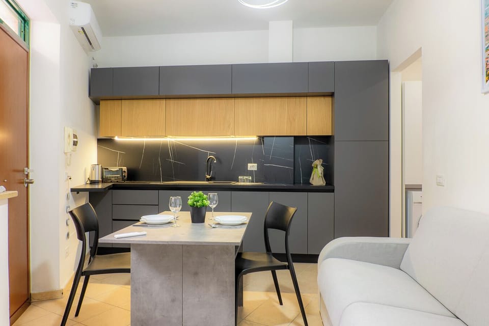 Apartment | Private kitchen | Full-size fridge, microwave, oven, stovetop
