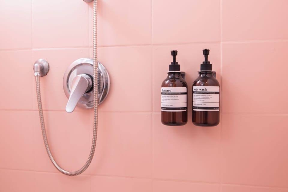 Quadruple Room | Bathroom | Shower, hair dryer, bidet, towels