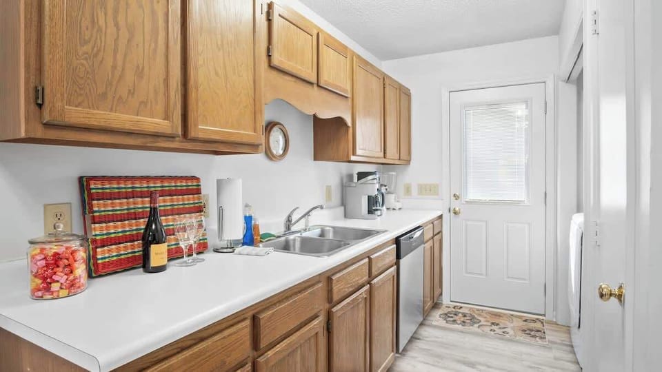 Fully equipped kitchen with modern appliances, ample counter space, and everything you need for a comfortable stay.