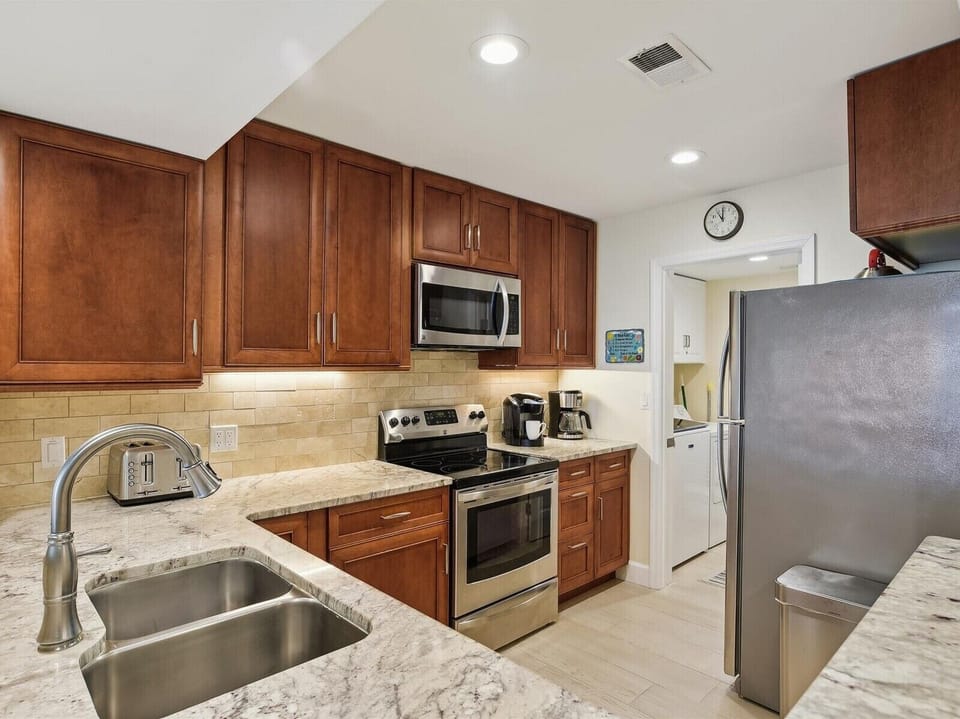 Kitchen with Stainless Steel Appliances at 402 Captains Walk