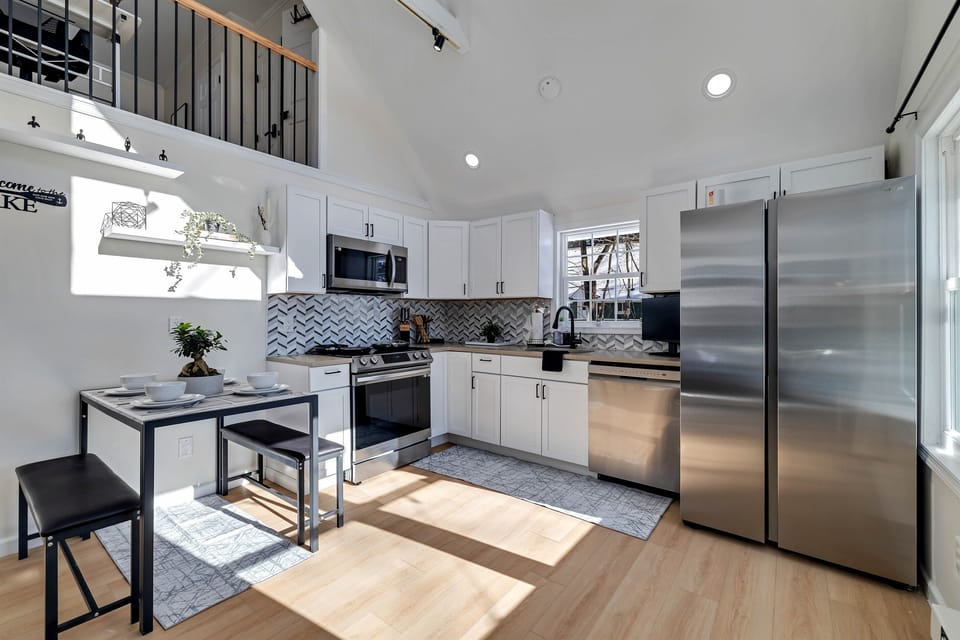 Fully stocked kitchen with stainless appliances