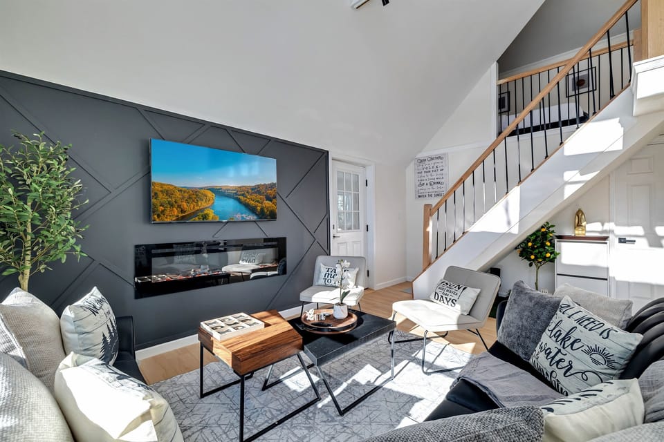 Living room with seating and Smart TV