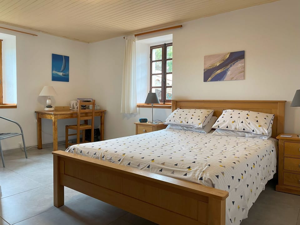 Chambre La Glycine avec King lit
