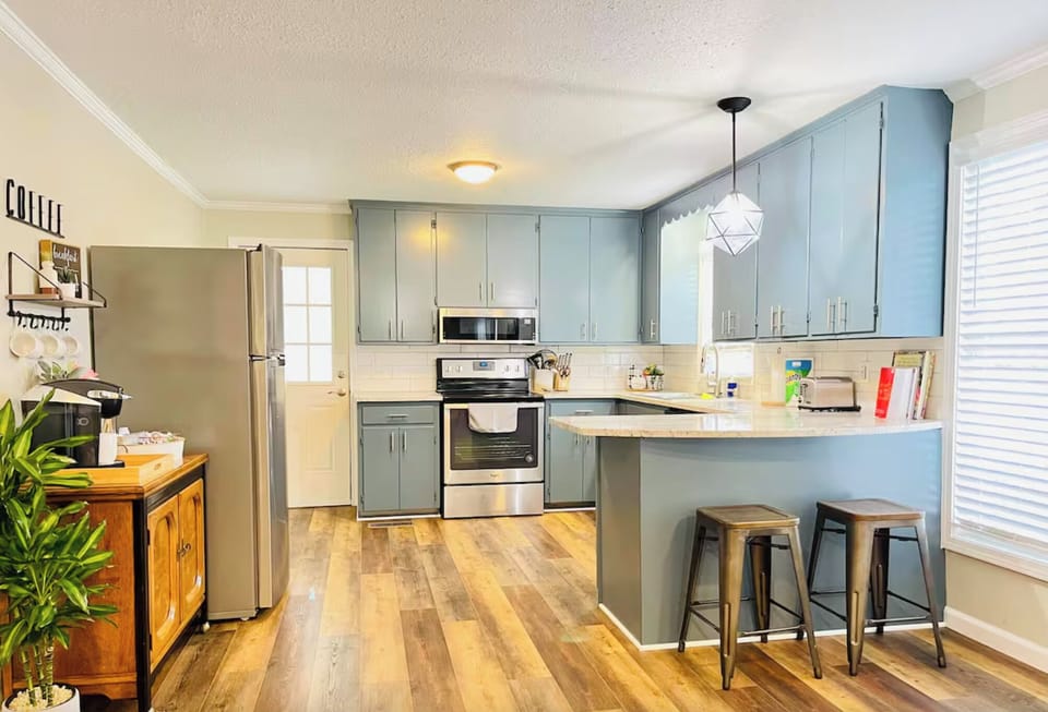 Fully equipped kitchen with modern appliances and essentials for easy cooking