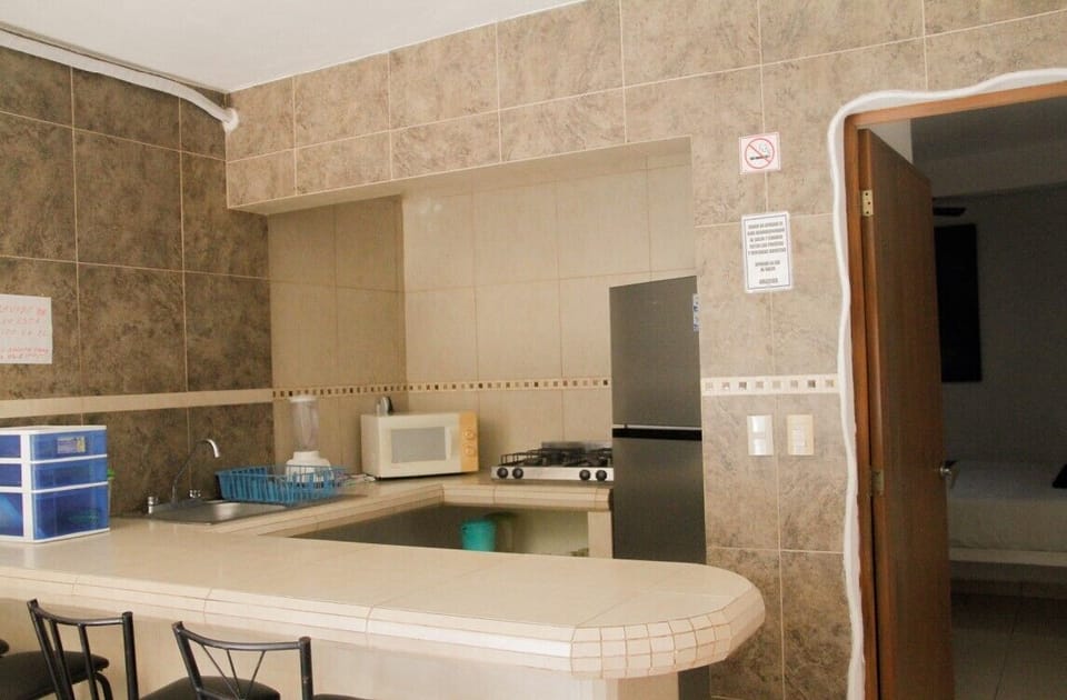 Comfort Apartment, Pool View | Private kitchen | Fridge, microwave, rice cooker, blender