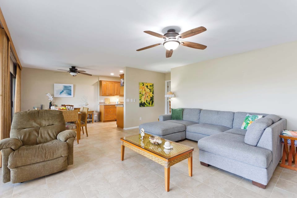 Living room with ample seating, featuring a sectional and La-Z-Boy recliner
