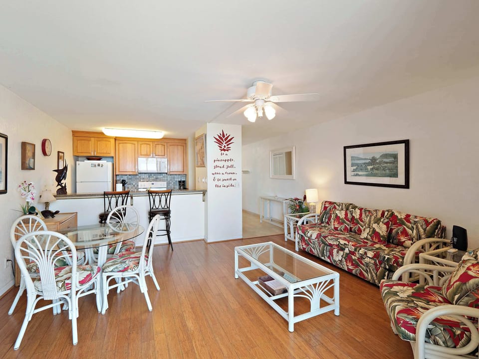 Living & dining area with queen sofa sleeper, TV, and table with seating for 4