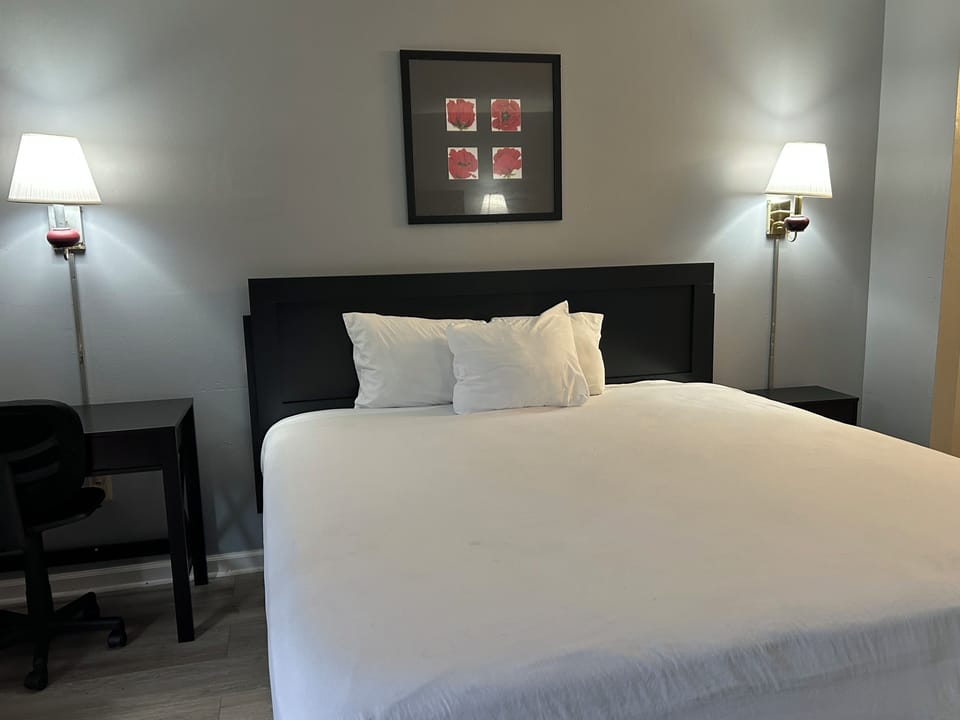 Desk, blackout drapes, iron/ironing board, free WiFi