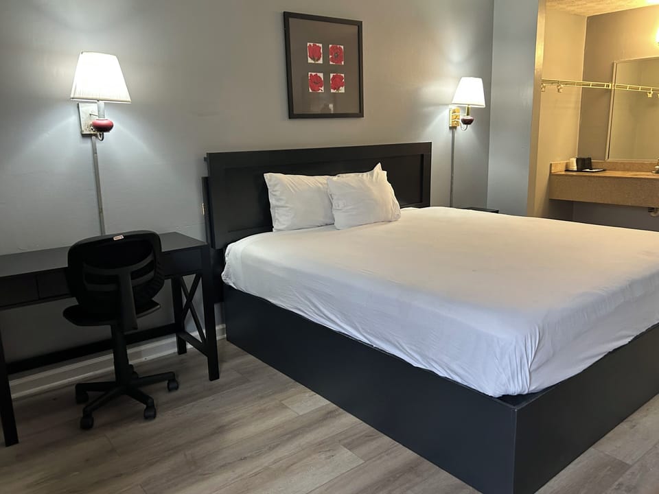 Desk, blackout drapes, iron/ironing board, free WiFi