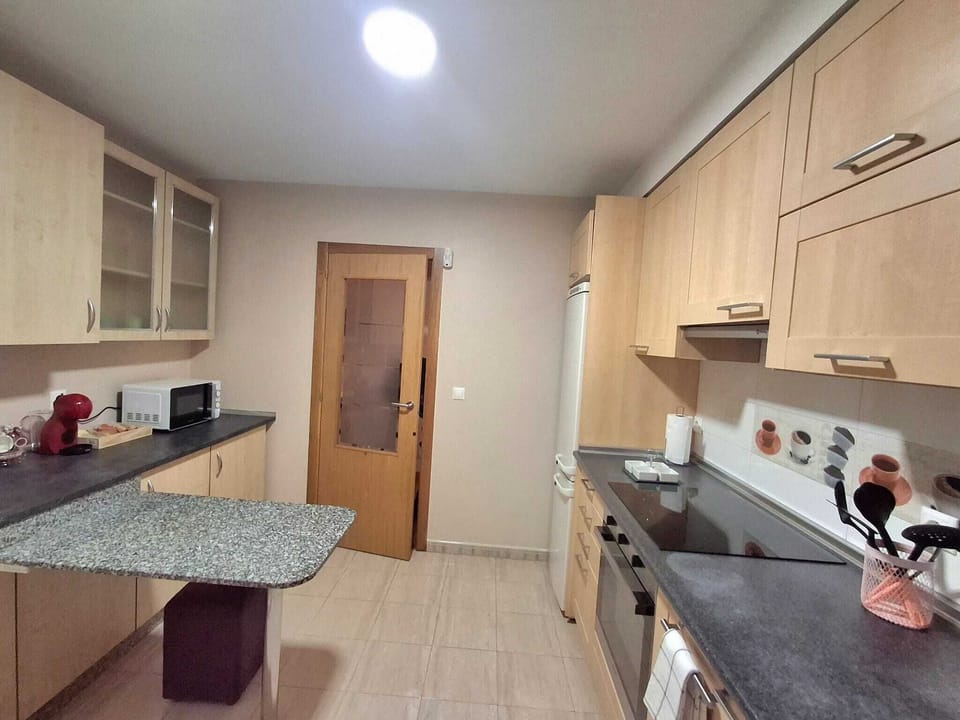 Classic Apartment | Private kitchen | Microwave, oven, stovetop, cookware/dishes/utensils