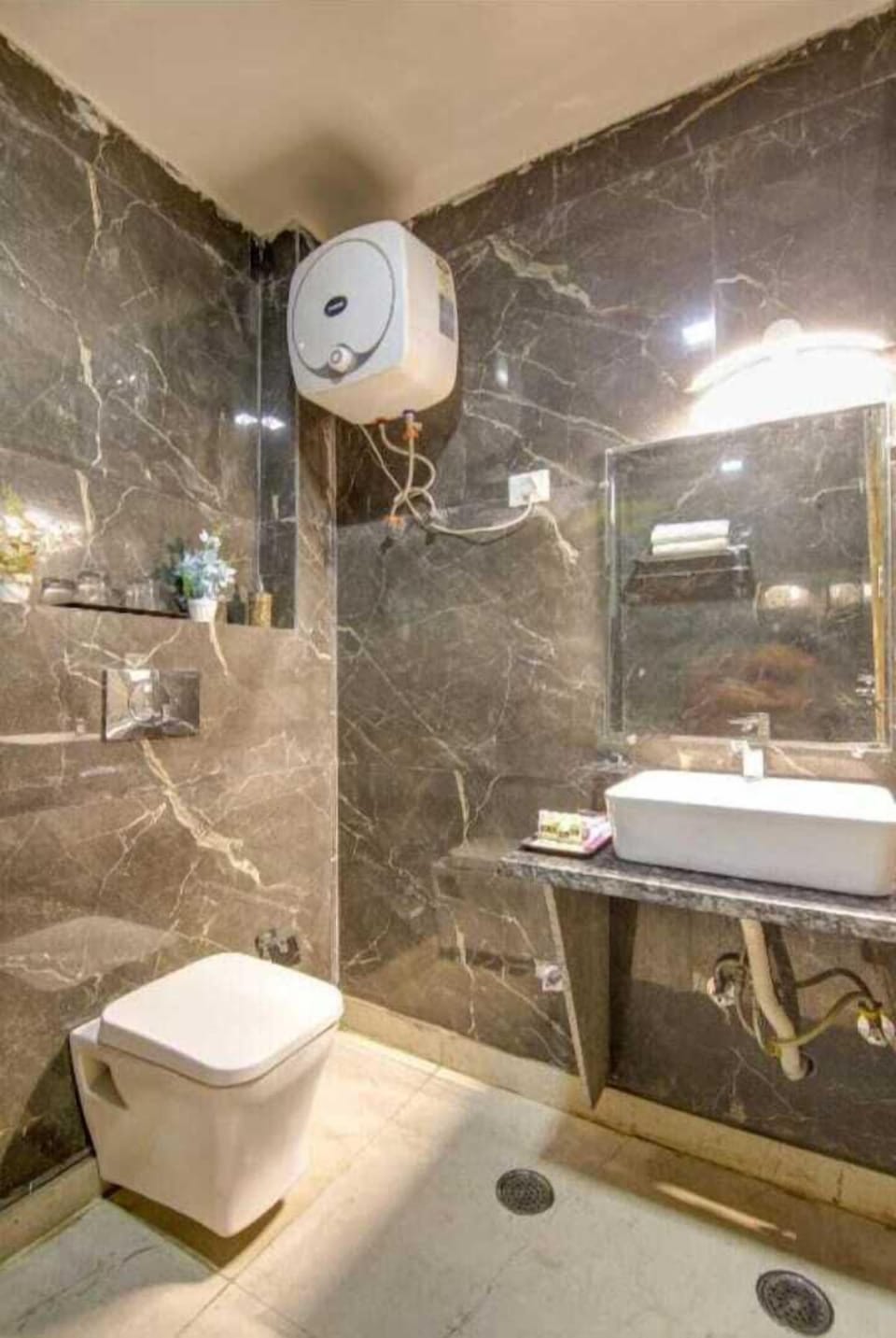 Shower, free toiletries, slippers, towels