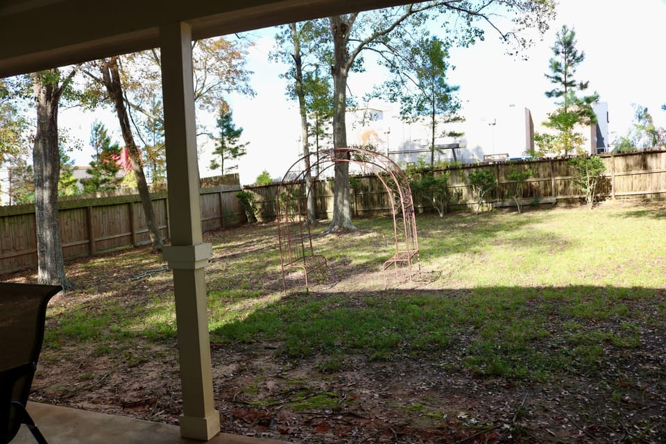 Large fenced in backyard.
