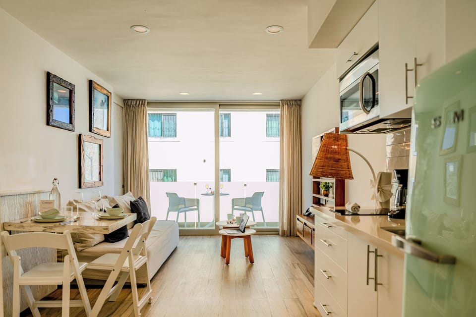 Superior Apartment, City View | Living area | 40-inch Smart TV with cable channels