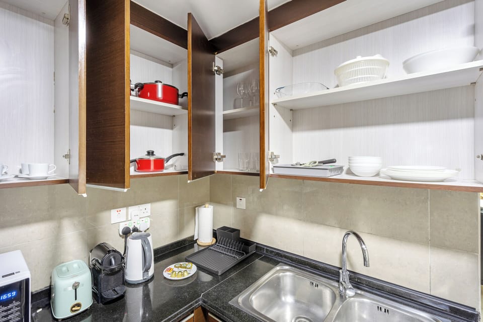 Classic Apartment | Private kitchen | Full-size fridge, microwave, coffee/tea maker, electric kettle