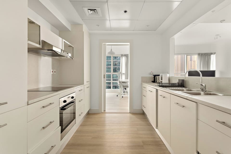 Exclusive Apartment, 1 King Bed | Private kitchen | Coffee/tea maker, full-size fridge, electric kettle, toaster