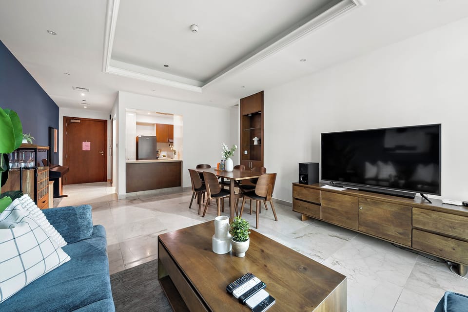 Classic Apartment, Multiple Beds | Living area | 50-inch Smart TV with digital channels