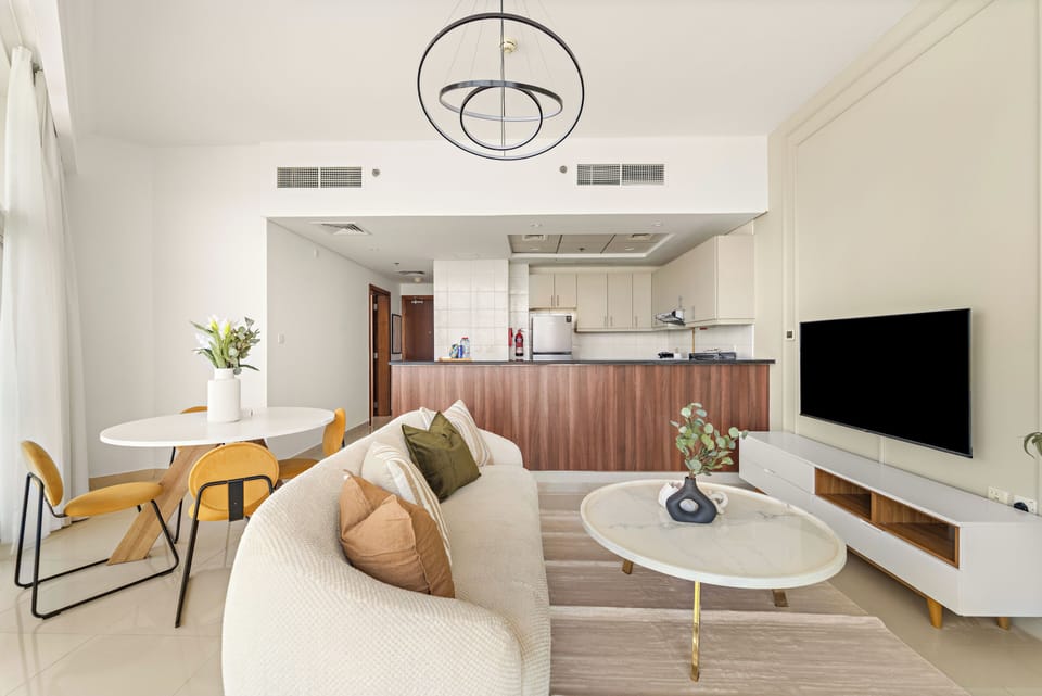 Premier Apartment, 1 King Bed | Living area | 50-inch Smart TV with digital channels