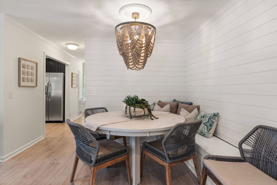 Dining room with seating for 6-7 featuring a comfortable bench for extra seating