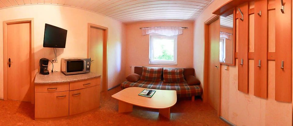 Standard Apartment, 2 Bedrooms | Living area | Flat-screen TV