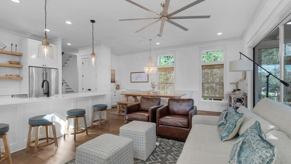 Living room: Smart TV, central heat, central A/C, main floor, screened-in porch access