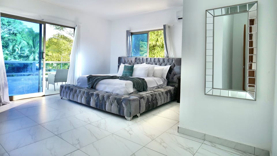Family Villa, Patio, Garden View | Laptop workspace, free WiFi