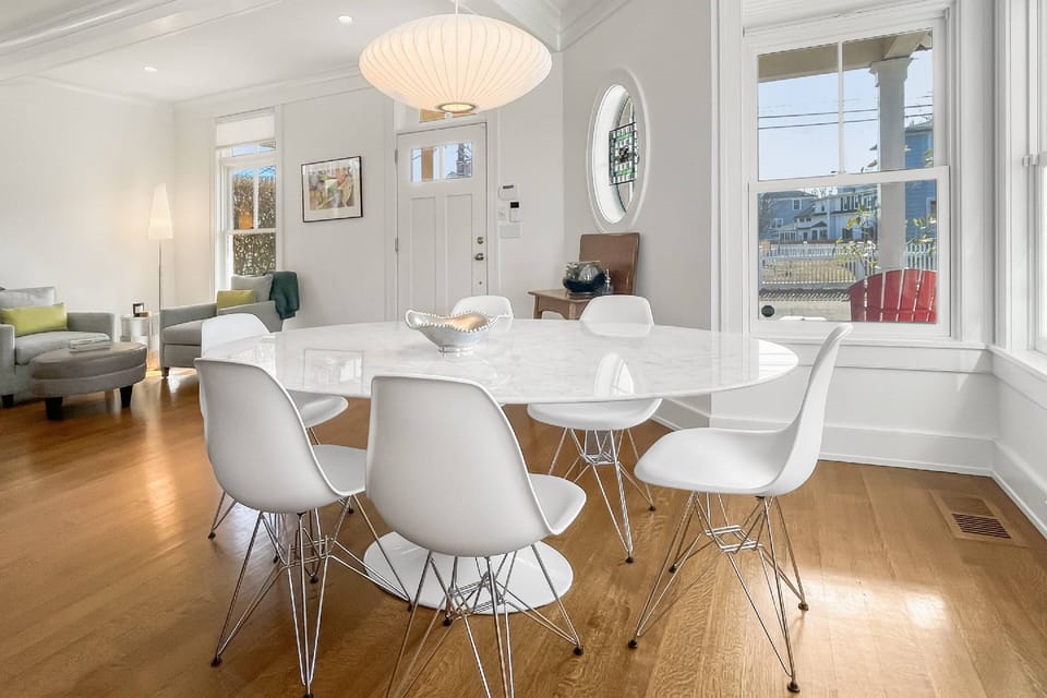 Enjoy meals with loved ones in the open-concept dining space, bathed in natural light and offering ocean views.