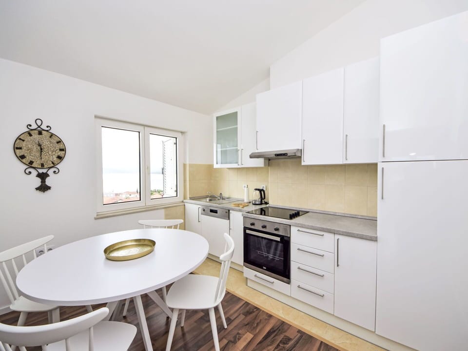 Cabinetry, Countertop, Property, Building, Window, Wood, Table, Kitchen, Flooring, Interior Design