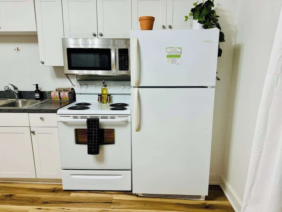 Start your day with coffee & convenience in this modern Columbus kitchen! ☕✨ #ColumbusStay