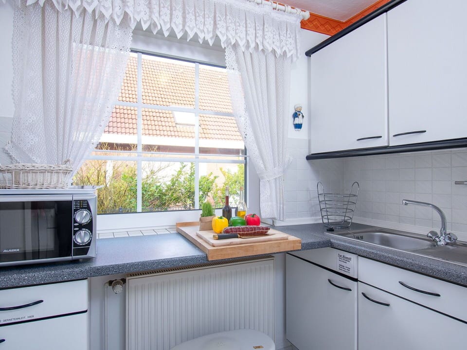 Kitchen, Interior Design, Countertop, Kitchen Appliance, Window Covering, Kitchen Sink, Major Appliance, Home, Plumbing Fixture, Lighting