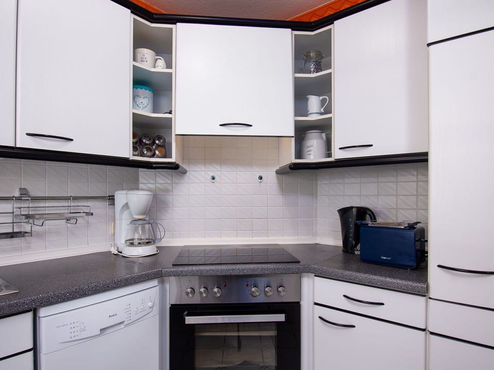 Kitchen, Cabinetry, Countertop, Kitchen Appliance, Major Appliance, Interior Design, Home Appliance, Flooring, Furniture, Cupboard