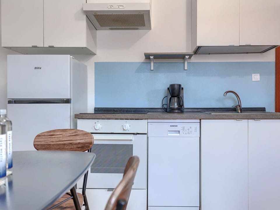 Interior Design, Kitchen, Major Appliance, Furniture, Kitchen Appliance, Flooring, Countertop, Cabinetry, Floor, Room