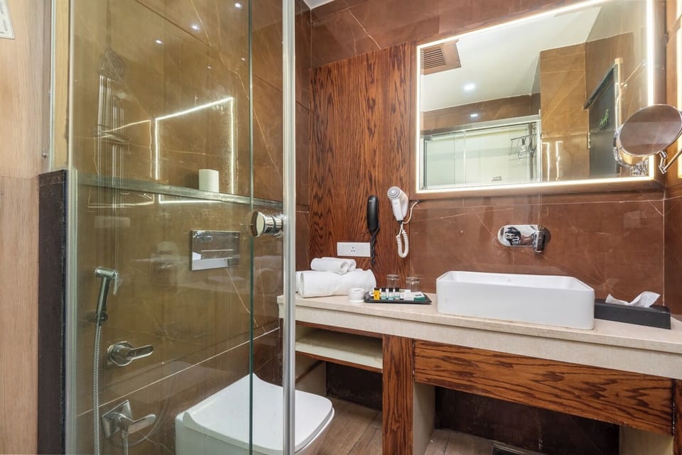 Luxury Triple Room, Balcony, Mountain View | Bathroom | Shower, free toiletries, hair dryer, slippers