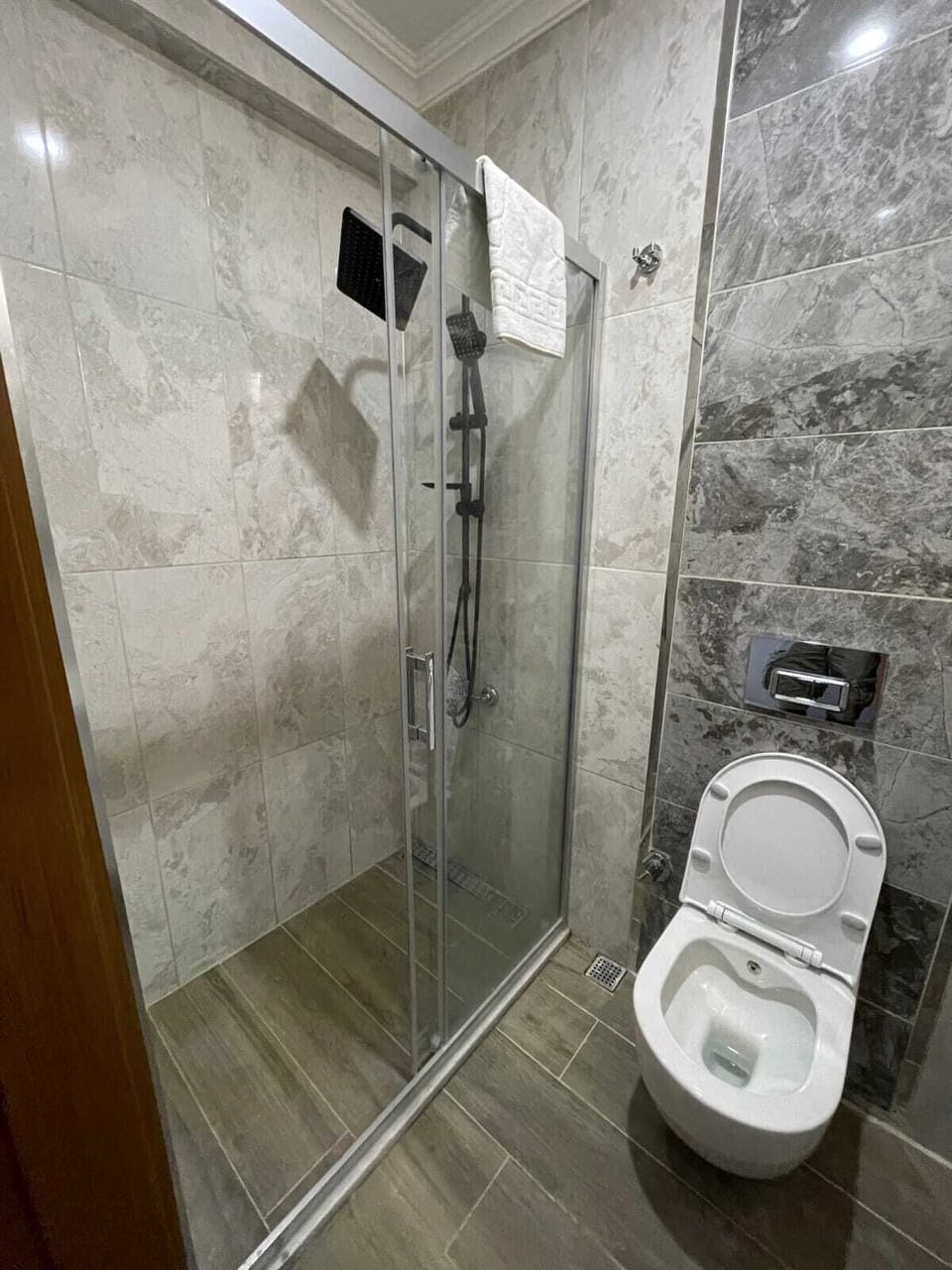 Shower, hair dryer, bathrobes, slippers