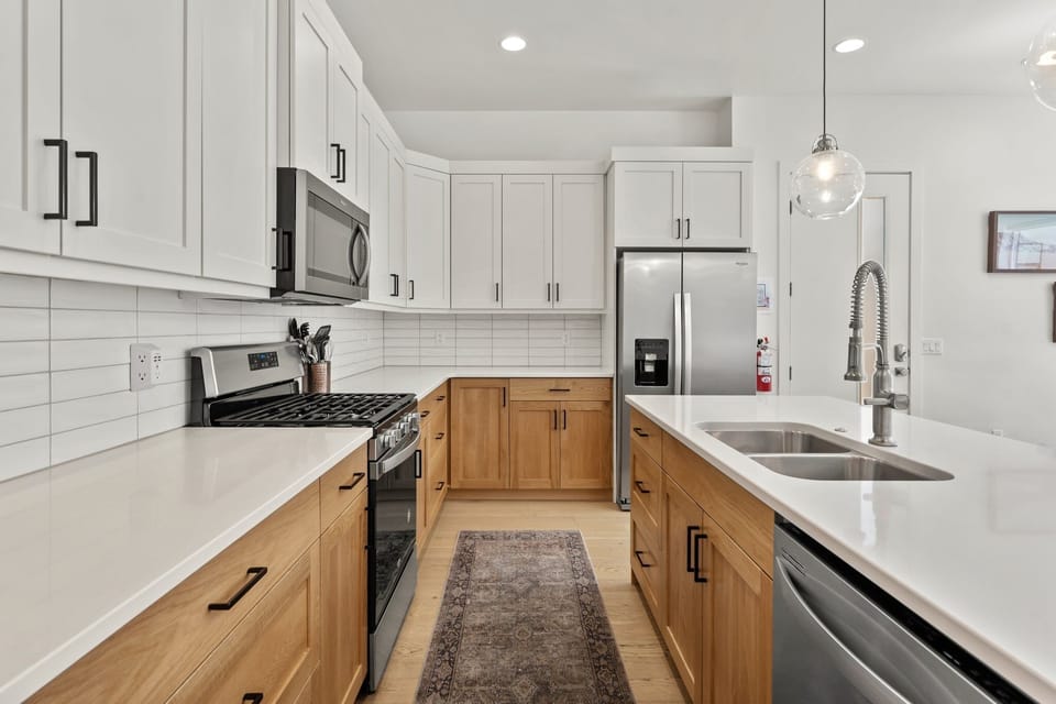 Townhome, 4 Bedrooms | Private kitchen | Fridge, oven, coffee/tea maker, toaster