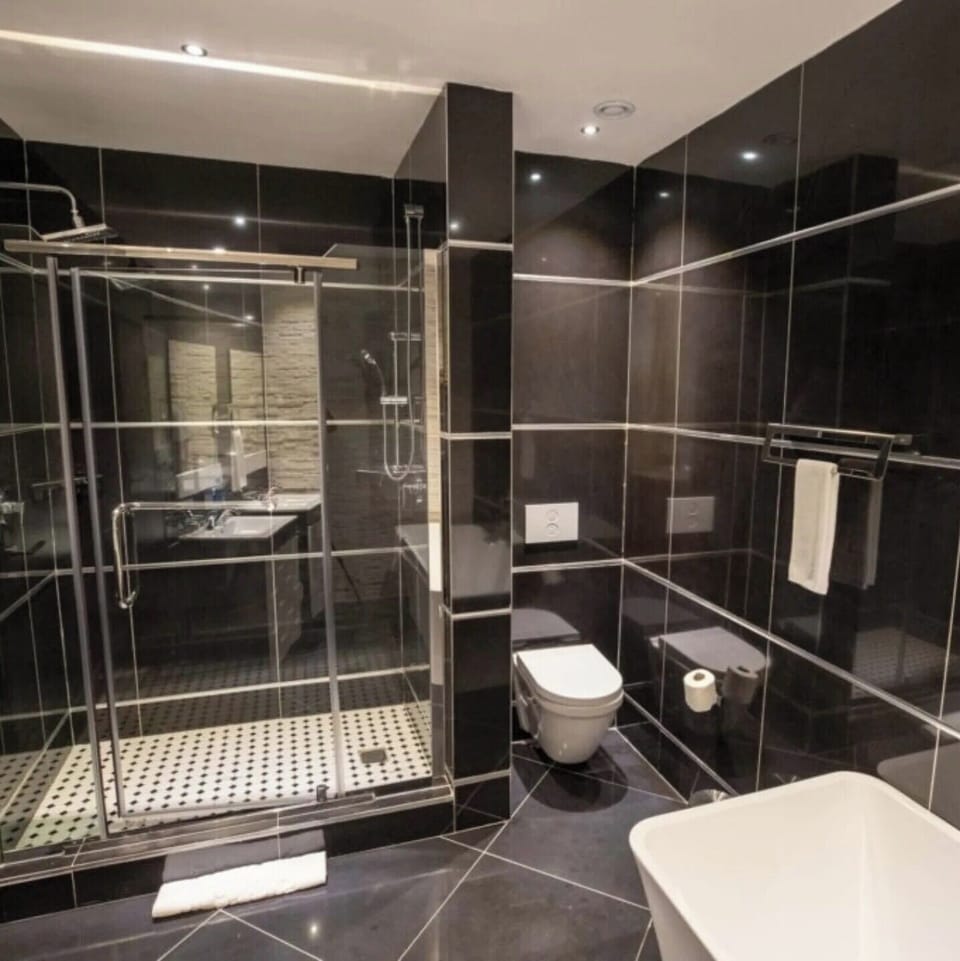 Economy Room, Balcony, City View | Bathroom | Free toiletries, hair dryer, towels, soap