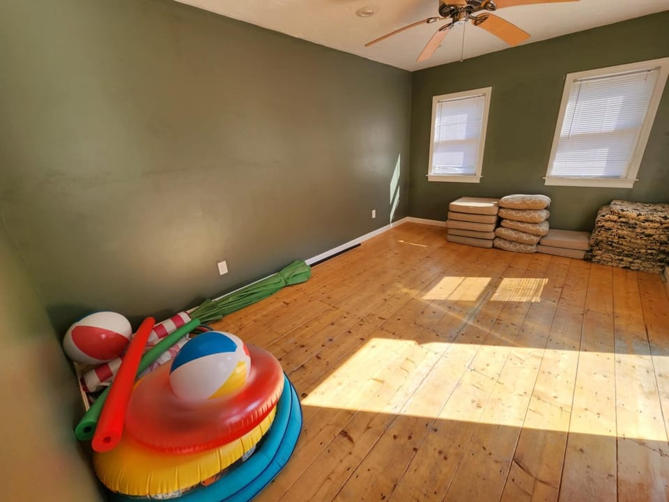 Pool house with electricity and pool toys, floaties, chair cushions