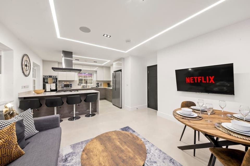 Step into the heart of luxury, where elegance meets comfort. This living room is designed to impress, featuring high ceilings, statement lighting, and plush seating that invites relaxation.