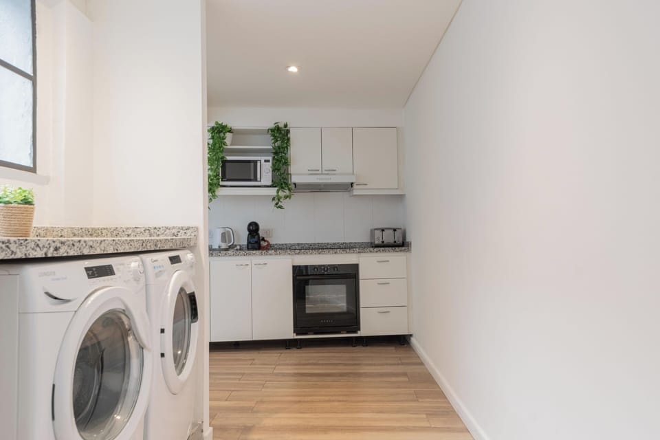 Townhome | Private kitchen | Full-size fridge