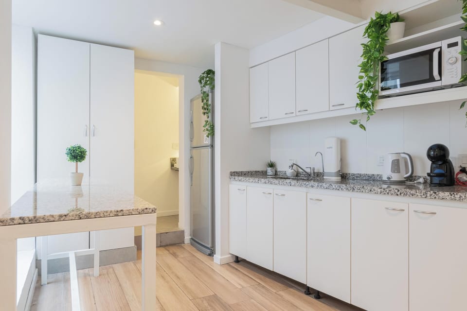 Townhome | Private kitchen | Full-size fridge